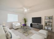 Thumbnail 29 of 43 - a living room filled with furniture and a flat screen tv
