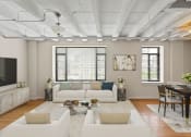 Thumbnail 20 of 43 - a living room with white couches and a table and a television