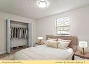 Thumbnail 14 of 24 - A bedroom with a large bed, a wooden nightstand with a lamp, and a closet with clothes hanging.