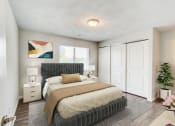 Thumbnail 5 of 43 - a bedroom with a large bed and a large window