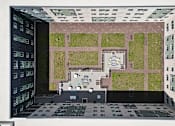 Thumbnail 6 of 56 - A model of a building with a green roof and a courtyard.