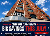 Thumbnail 44 of 44 - A poster advertising big savings on July 31st with a building in the background.