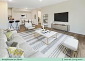 Thumbnail 23 of 31 - a living room with a couch and a tv