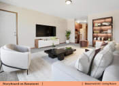 Thumbnail 12 of 30 - a living room with a couch and a tv
