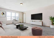 Thumbnail 13 of 30 - a living room with a couch and a tv