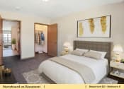 Thumbnail 20 of 30 - a bedroom with a bed and a closet