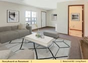 Thumbnail 21 of 30 - a living room with a couch and a table