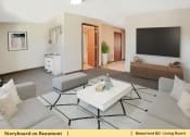 Thumbnail 25 of 30 - a living room with a couch and a table