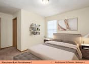 Thumbnail 17 of 29 - a bedroom with a bed and a window