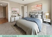 Thumbnail 26 of 58 - a bedroom with a bed and a closet