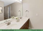 Thumbnail 14 of 58 - a bathroom with two sinks and a large mirror