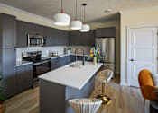 Thumbnail 38 of 50 - Designer Kitchen at Clove Apartments, Omaha, NE