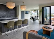 Thumbnail 25 of 50 - Living Room and Kitchen at Clove Apartments, Nebraska