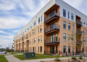 Thumbnail 38 of 43 - Building Front Exterior at Parallel Apartments, Omaha, NE