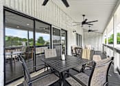 Thumbnail 28 of 32 - Patio at Renaissance at Carol Stream featuring a table and chairs in Carol Stream, IL.