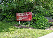 Thumbnail 18 of 18 - A sign for Shelbyville Place Apartments is now leasing.