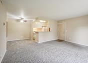 Thumbnail 35 of 39 - Empty room with a ceiling fan and carpeted floor.