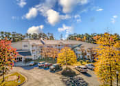 Thumbnail 31 of 32 - our apartments offer a parking lot for your car