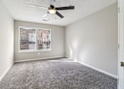 Thumbnail 10 of 32 - Room with carpet and ceiling fan at Avalon Place Columbia SC