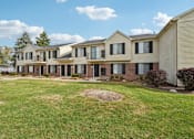 Thumbnail 30 of 32 - Apartment buildings with green space at Bainbridge Park Canton MI