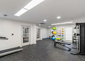 Thumbnail 20 of 25 - Fitness center with weights and equipment at Park at Meadow Ridge Montgomery AL
