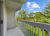 Thumbnail 13 of 39 - the view of the yard from the balcony of a house