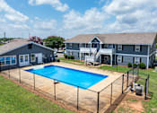 Thumbnail 9 of 23 - Property with pool area at Arbours at Victoria Place Prattville AL