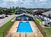 Thumbnail 10 of 23 - Fenced swimming pool at Arbours at Victoria Place Prattville AL
