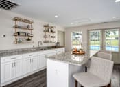 Thumbnail 7 of 23 - Kitchen with marble countertops at Arbours at Victoria Place Prattville AL