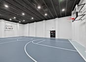Thumbnail 29 of 32 - Basketball court with a hoop at Renaissance at Carol Stream in Carol Stream, IL.