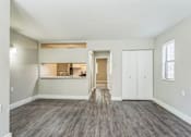 Thumbnail 2 of 30 - A room with a grey floor and white walls.