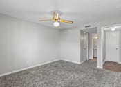 Thumbnail 9 of 25 - Room with carpet and ceiling fan at Park at Meadow Ridge Montgomery AL