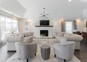 Thumbnail 15 of 25 - Community lounge with fireplace and TV at Park at Meadow Ridge Montgomery AL