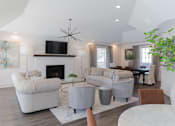 Thumbnail 19 of 25 - Lounge with fireplace and TV at Park at Meadow Ridge Montgomery AL