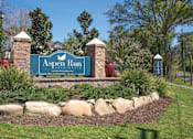 Thumbnail 32 of 37 - A sign that says "Aspen Run" is in front of a grassy area.