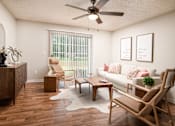 Thumbnail 1 of 22 - Bright living room with modern furnishings at Southwind Apartments in Richland, MS.