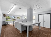 Thumbnail 20 of 25 - Community Laundry Room at Lakeland East Apartments – Flowood, MS