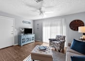 Thumbnail 11 of 25 - Stylish Living Room at Lakeland East Apartments – Flowood, MS