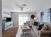 Thumbnail 7 of 25 - Comfortable Living Room at Lakeland East Apartments – Flowood, MS