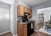 Thumbnail 3 of 25 - Fully Equipped Kitchen at Lakeland East Apartments – Flowood, MS