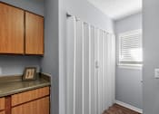 Thumbnail 4 of 25 - Spacious Kitchen with Pantry at Lakeland East Apartments – Flowood, MS