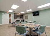 Thumbnail 15 of 16 - A room with a table and chairs in it at Sweetwater Point in Douglasville, GA