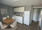 Thumbnail 12 of 22 - Kitchen With Dining Area at The Summit, New York, 13210