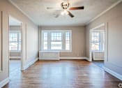 Thumbnail 12 of 31 - Main Living Room at Lifestyle Apartments at Syracuse, Syracuse