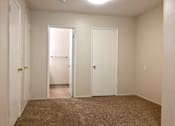 Thumbnail 11 of 20 - Carpeted bedroom and closet door