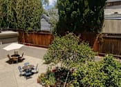 Thumbnail 6 of 20 - 470 Courtyard with Tables and Unbrella