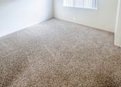Thumbnail 32 of 34 - Monterey Manor vacant apartment bedroom with carpet , window and blinds