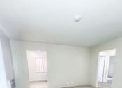 Thumbnail 12 of 34 - Monterey Manor vacant apartment living room with carpet