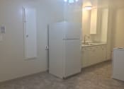 Thumbnail 13 of 20 - Kitchen with a refrigerator and a sink