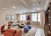 Thumbnail 17 of 57 - a living room with couches and chairs and a rug at Swiftwater Luxury apartments in Port Charlotte, FL